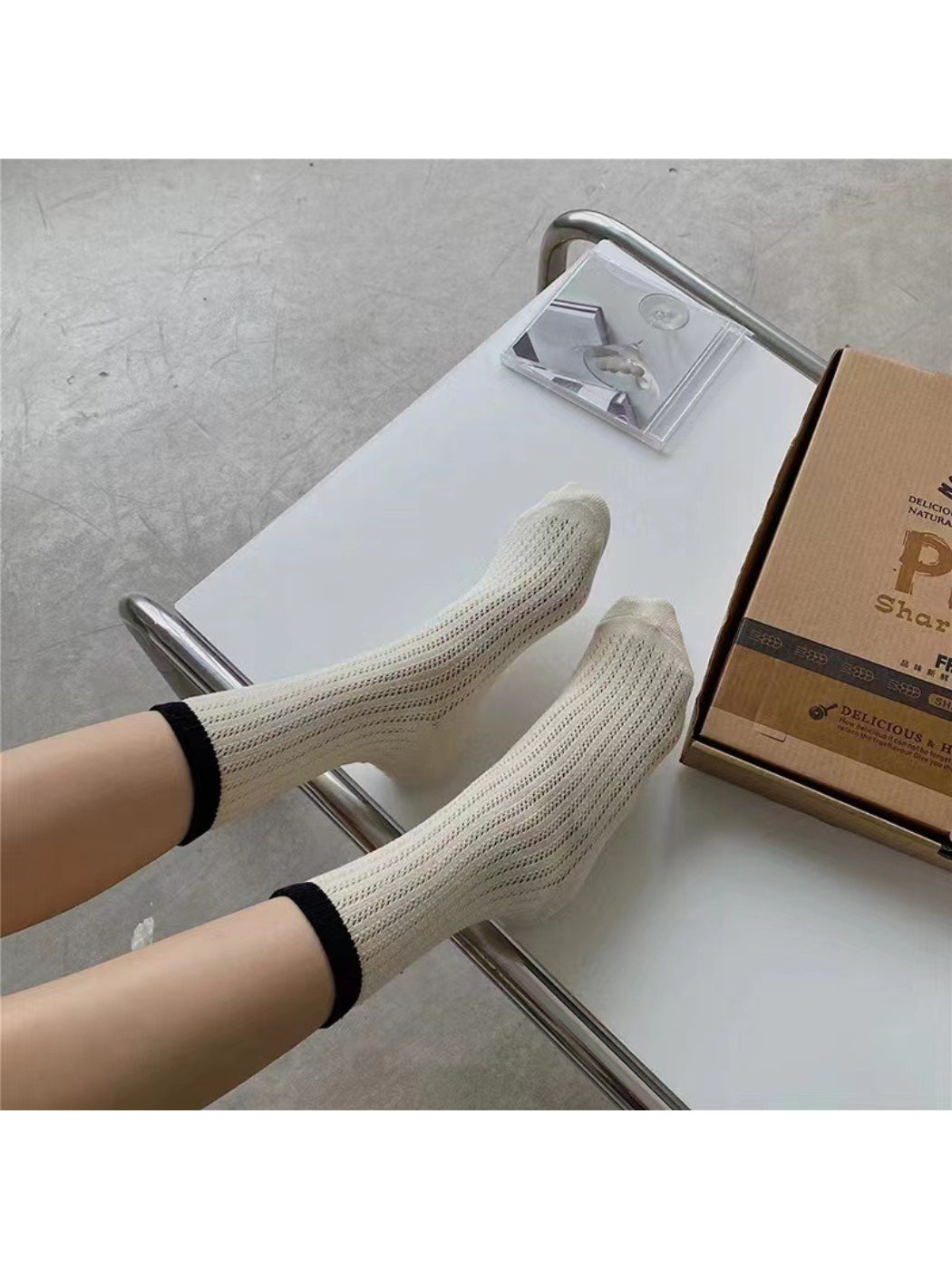 Rufia mesh color block mid-calf socks in a flat lay showing vibrant color sections