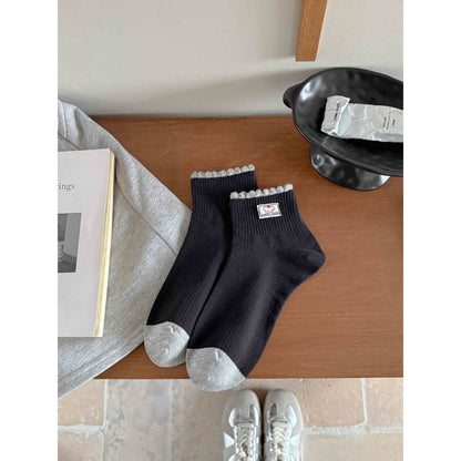 Model wearing Rufia contrast toe ribbed ankle socks with casual shoes