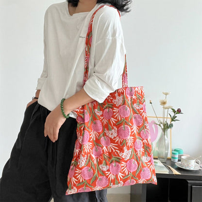 Close-up of floral print and stitching details on Cosbai Warm Floral Carryall Tote