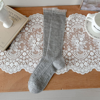 Rufia soft stretch ribbed crew socks folded neatly on white background