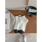 Side view of Rufia ankle socks highlighting ribbed design and black toe