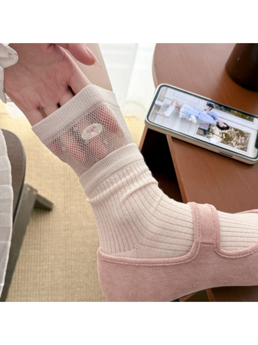 Rufia embroidered mesh mid-calf socks displayed flat on white background