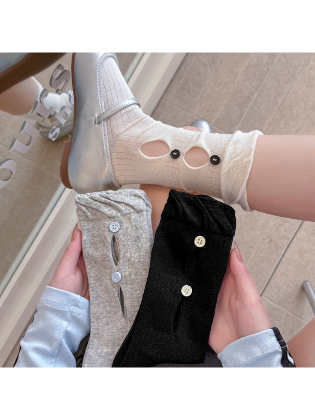 Rufia button cut out crew socks in white, showing front view with button details