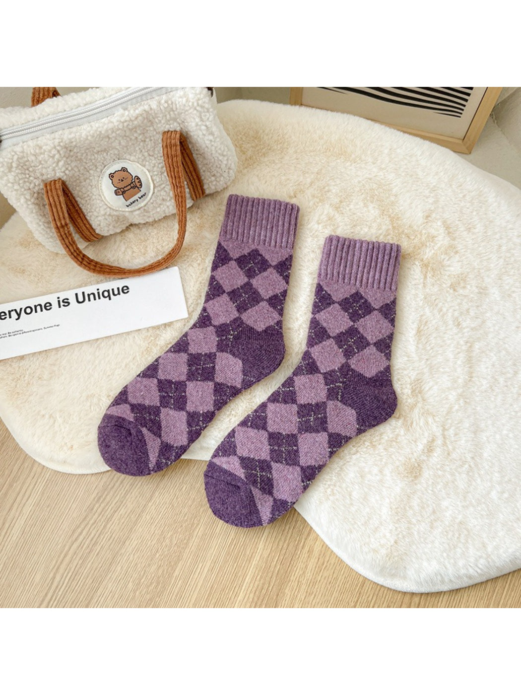 Rufia purple checker crew socks flat lay