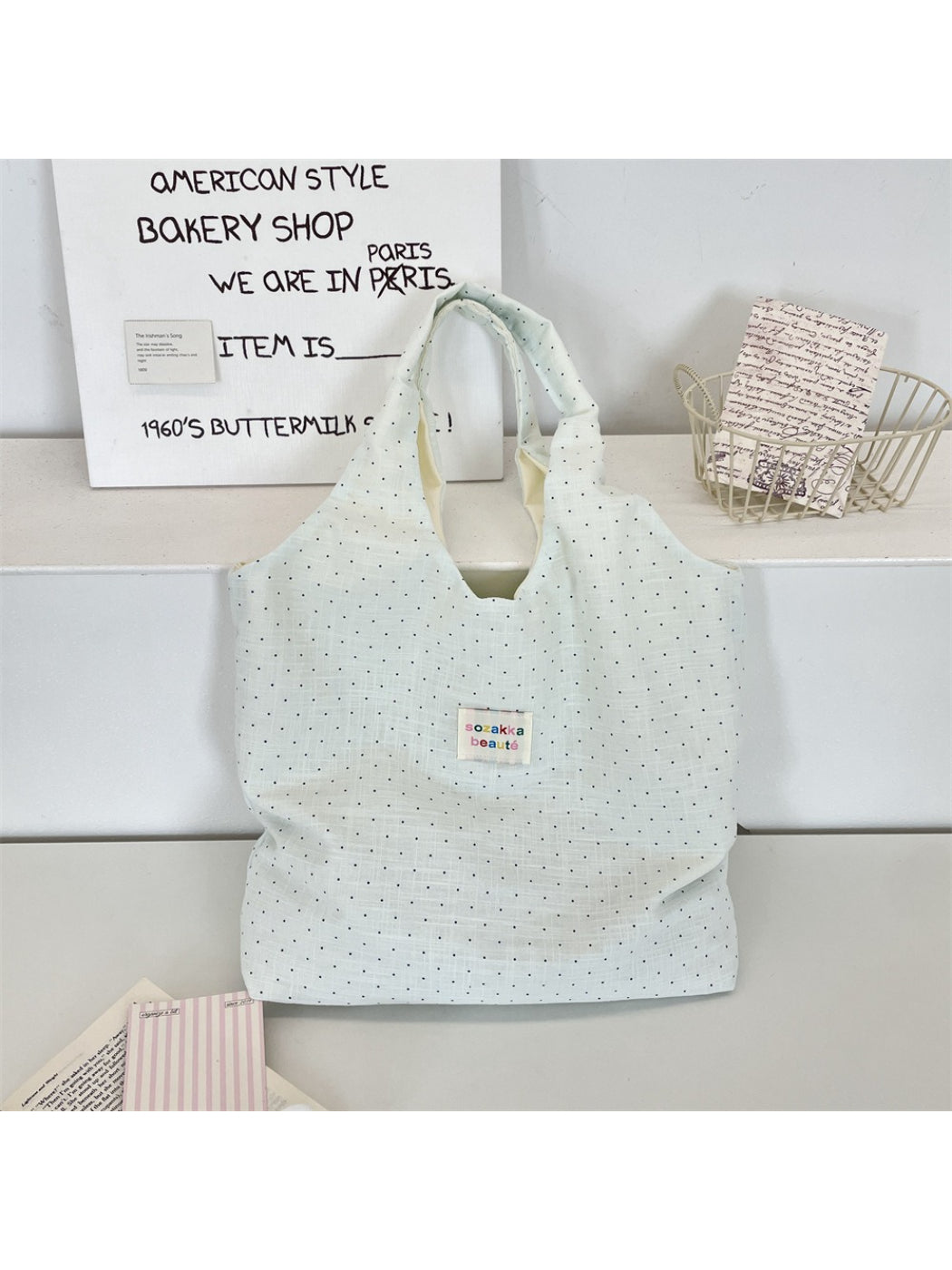 Close-up of Cosbai soft polka dot shoulder tote bag strap and fabric detail
