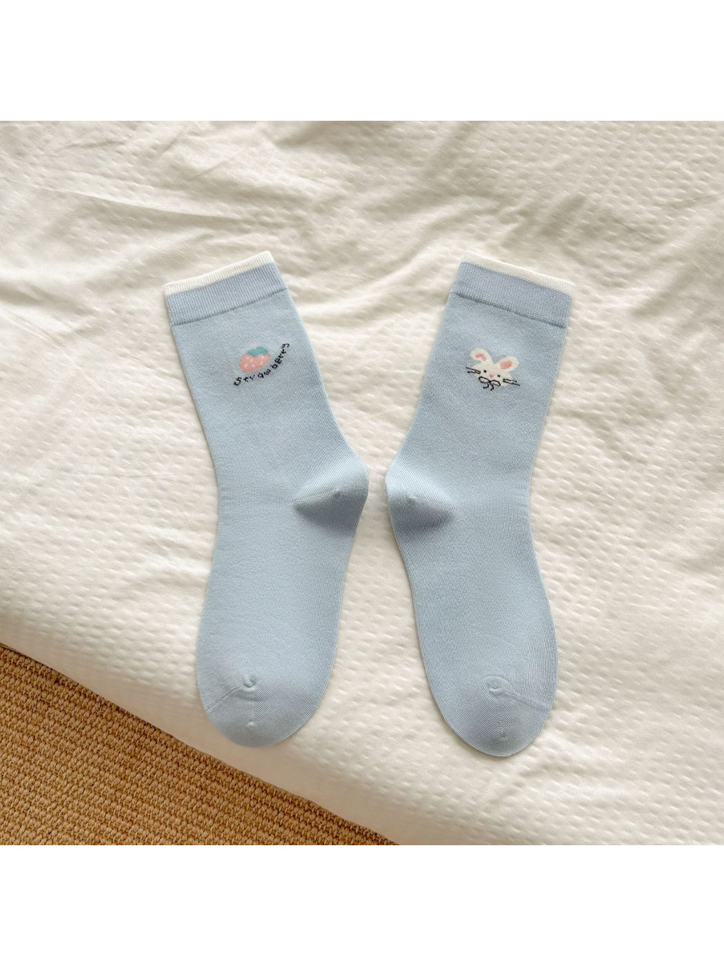 Side view of Rufia soft animal motif crew socks showing bear design and ribbed cuff