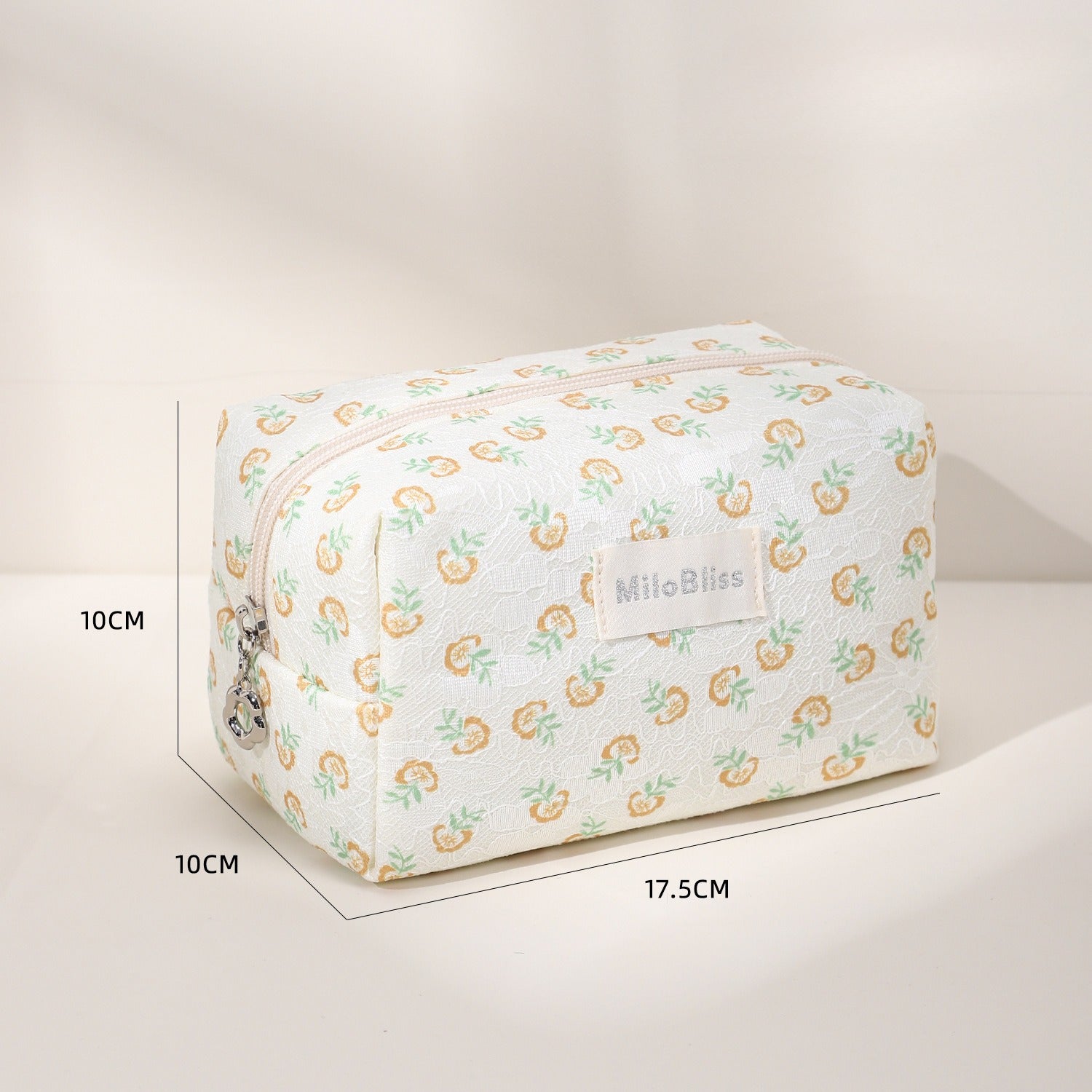 Cosbai small floral makeup organizer placed on a white surface with natural lighting