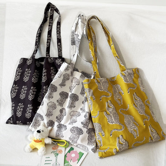Cosbai tote bag with colorful animal and floral print on fabric