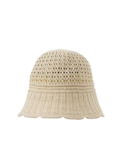 Side view of the Haila open knit summer bucket hat showing its shape and brim
