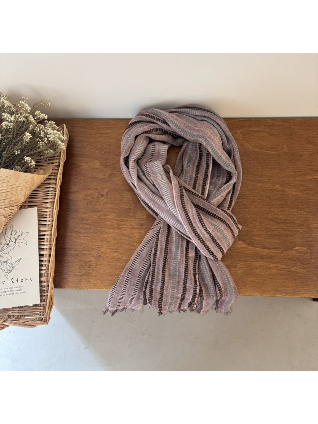 Scarvii long scarf folded with visible fringed edges and stripe details