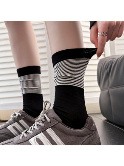 Rufia ribbed stripe mid-calf socks arranged to show overall ribbed stripe pattern