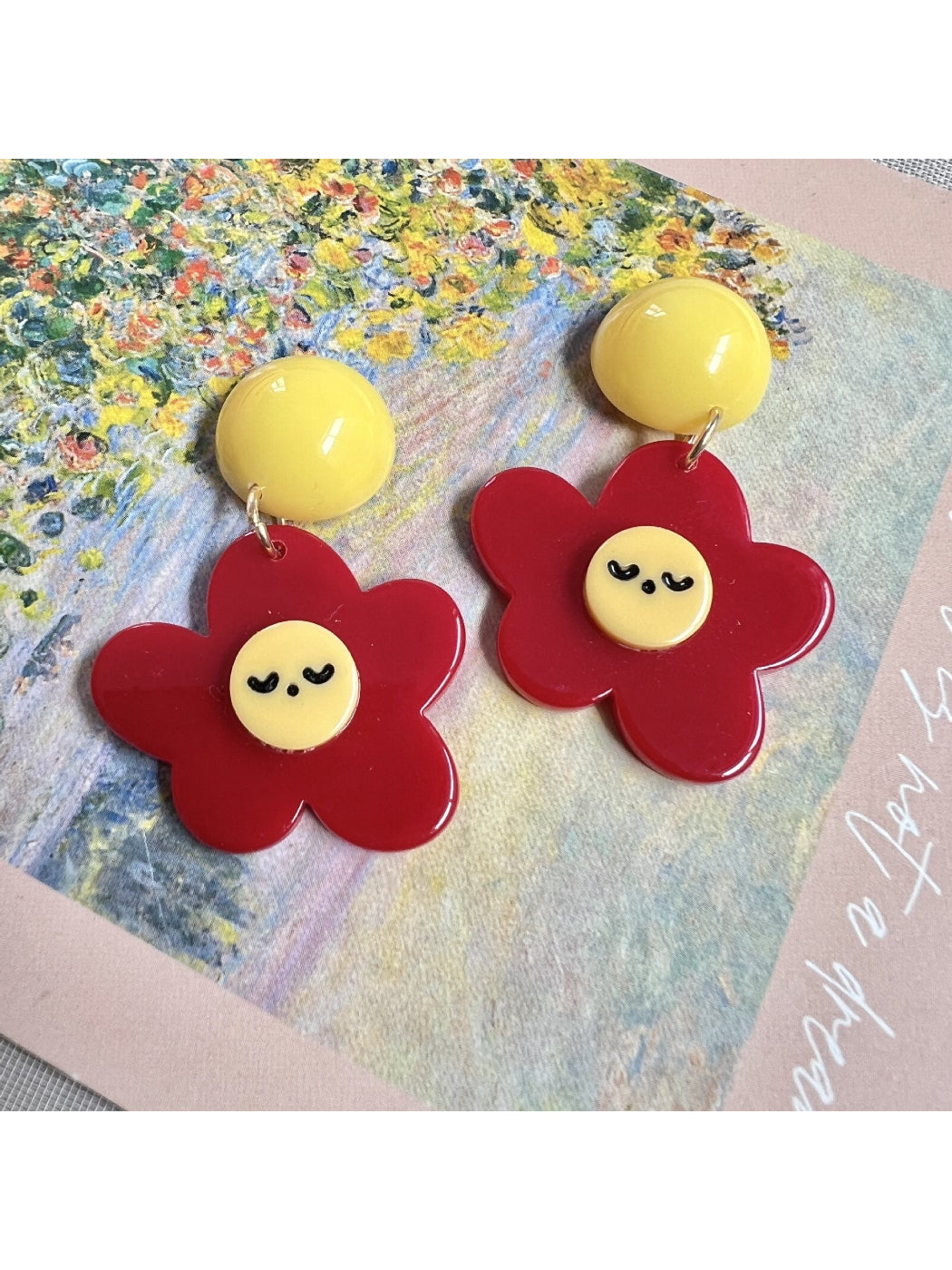 Side view of Earwish Smiley Flower Drop Earrings highlighting drop design