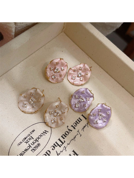 Earwish soft color floral stud earrings displayed on a white background