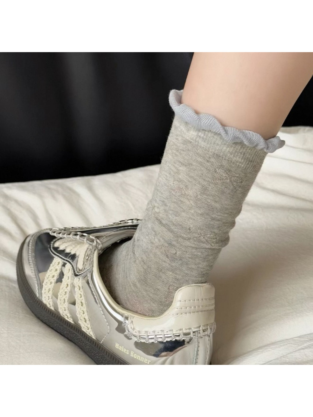 Rufia Pale Bow Everyday Socks worn on feet with visible ribbing