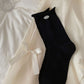 Rufia mesh dot mid-calf socks displayed on a mannequin leg showing fit and pattern