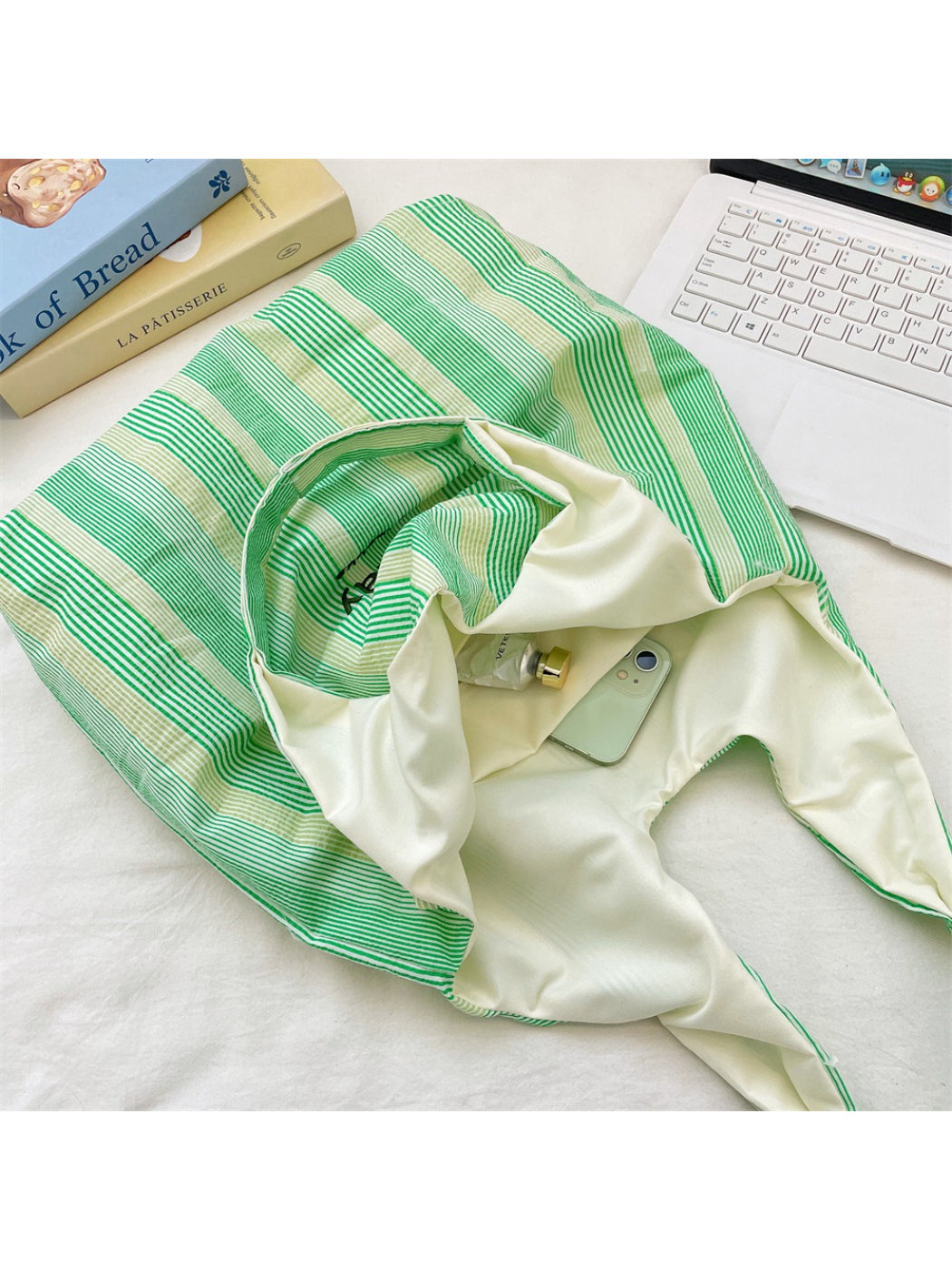 Side view of Cosbai Enjoy Today striped tote bag highlighting its rectangular shape and fabric texture