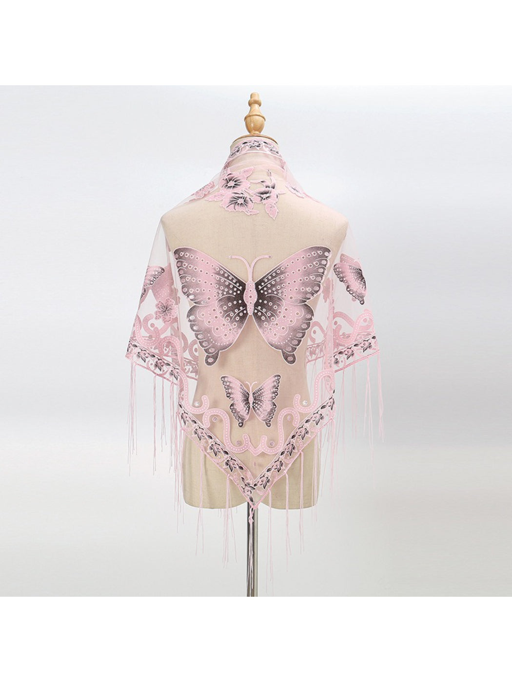 Close-up of fringed edge detail on Scarvii Butterfly Fringe Triangle Scarf with butterfly print