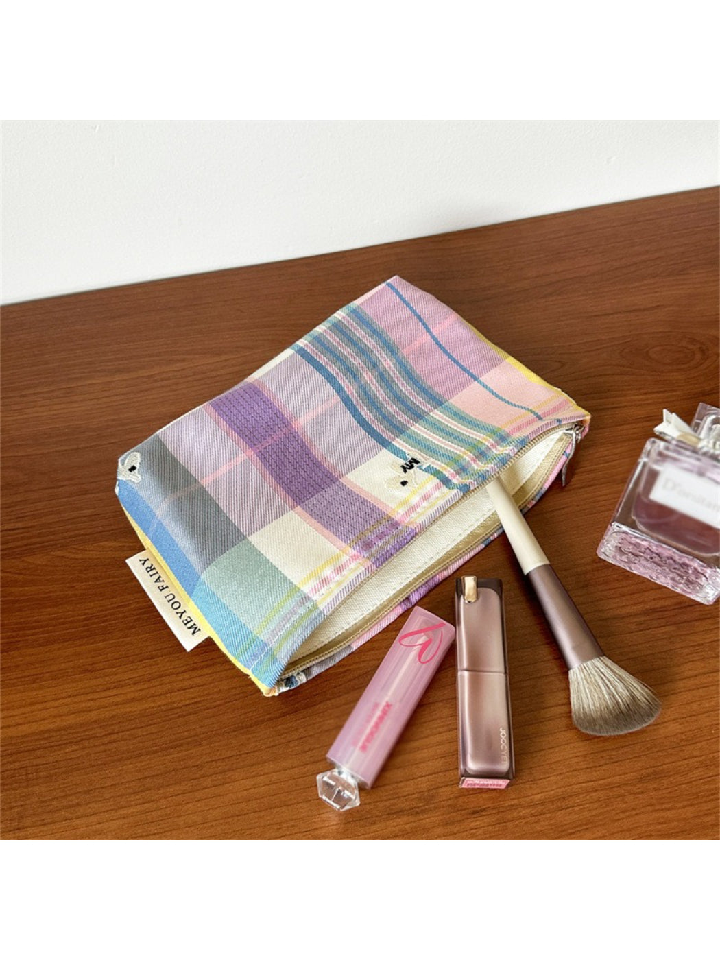 Cosbai Classic Plaid Travel Cosmetic Pouch shown with travel essentials inside
