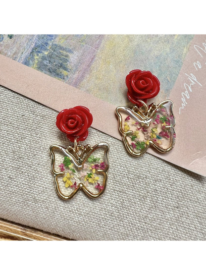 Side view of Earwish Rose Butterfly Drop Earrings showing delicate butterfly detail