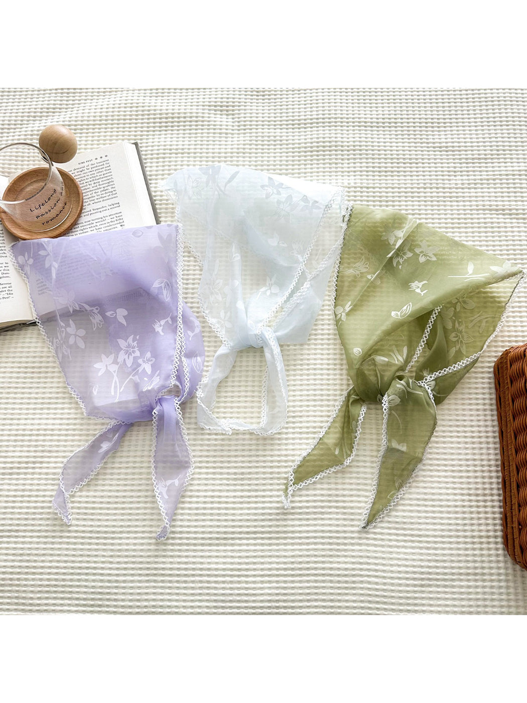 Romantic sheer triangle scarf with delicate flower pattern in soft pastel colors