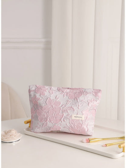 Cosbai floral cosmetic bag with vibrant flower design in pink and white tones