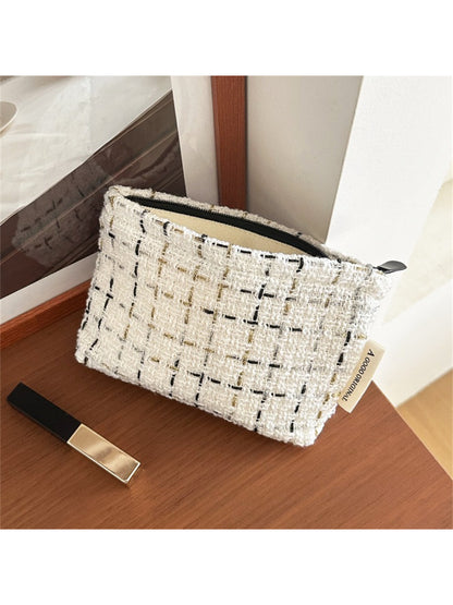 Close-up of textured tweed fabric on Cosbai makeup organizer pouch