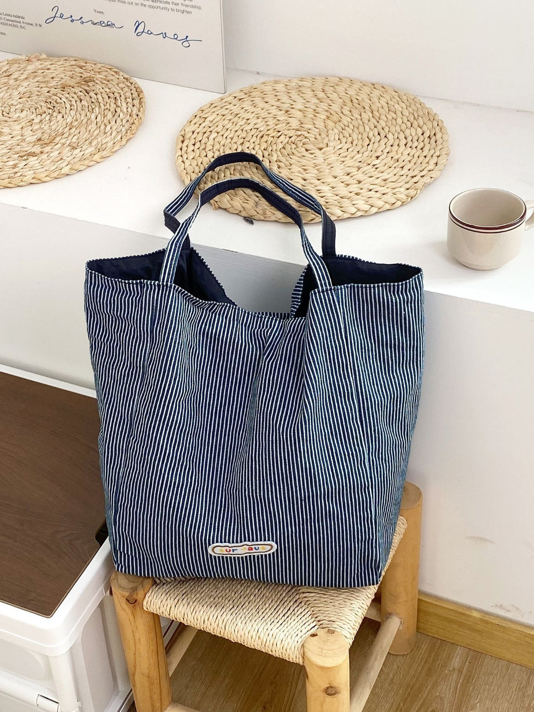 Cosbai tote bag reversed to show alternate striped design