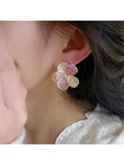 Side view of Earwish multicolor floral cluster earrings highlighting the clasp