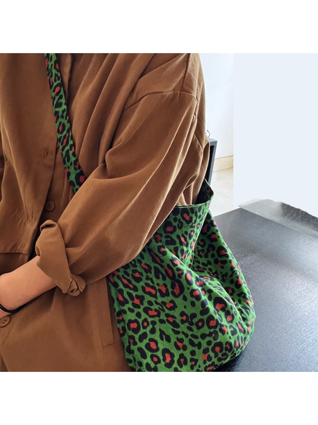 Side view of Cosbai Neon Leopard Slouch Tote Bag showing slouchy shape and print details