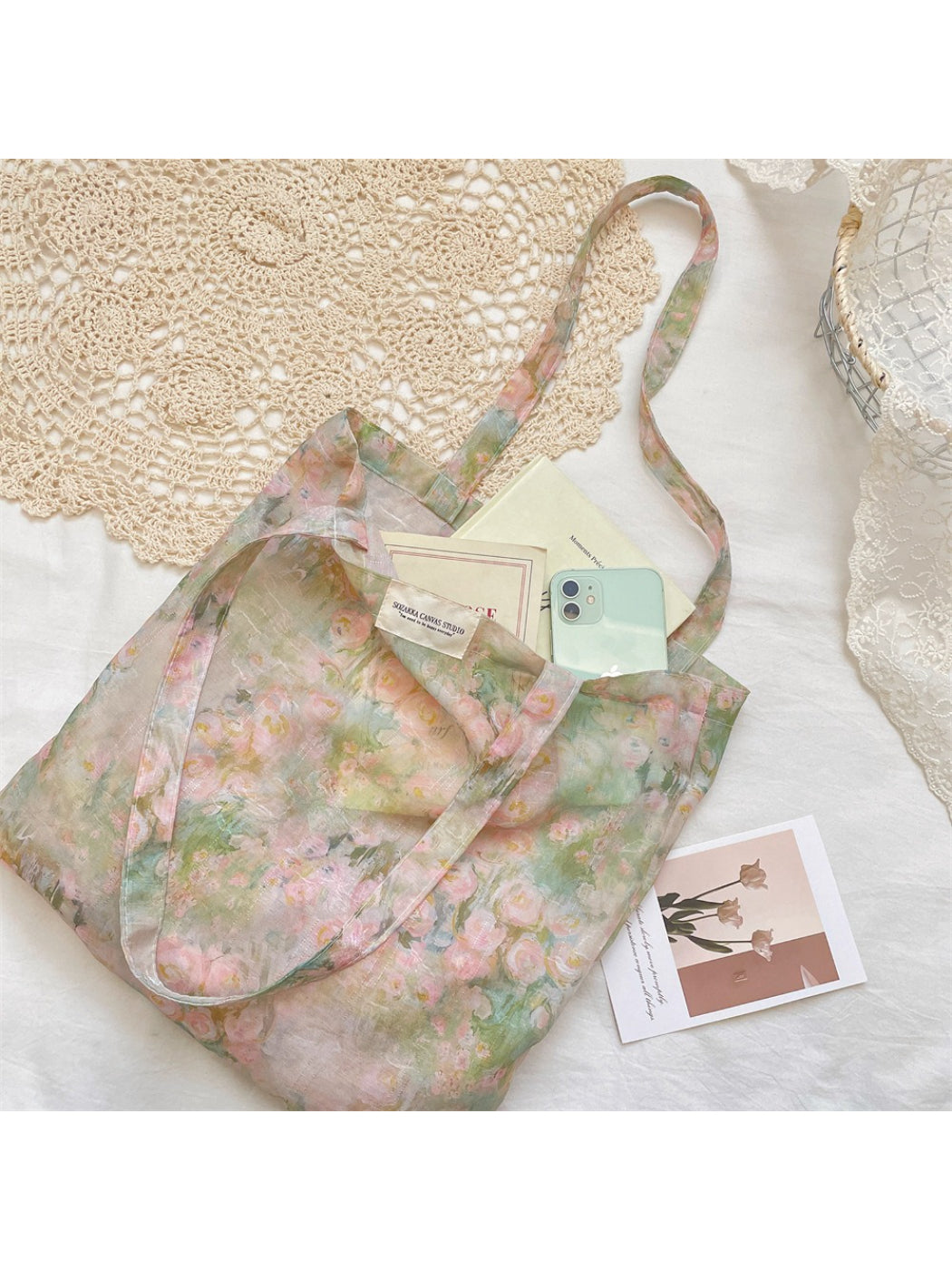 Blush floral shoulder tote bag with long handles displayed on white background