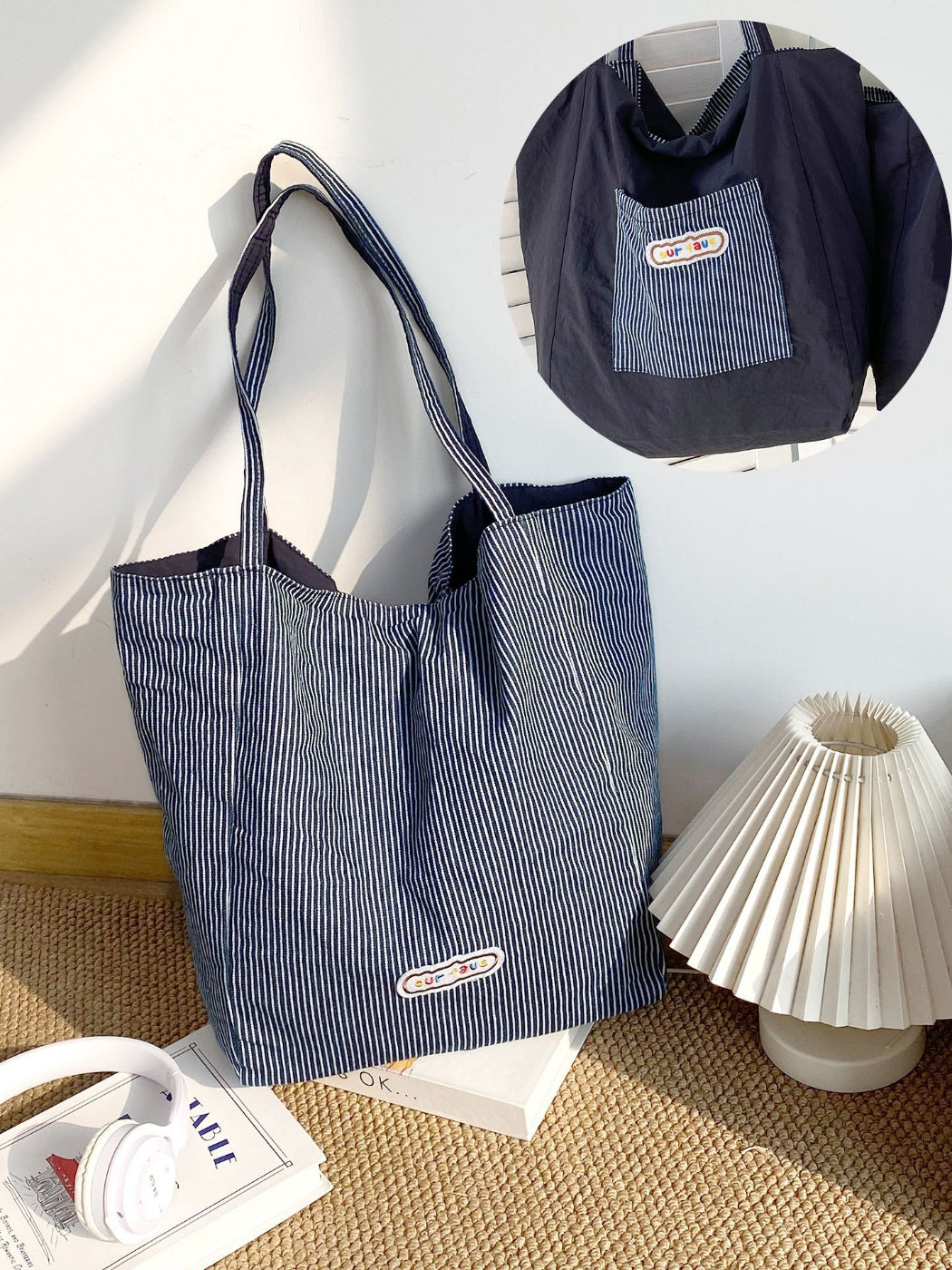 Cosbai striped reversible tote bag shown flat with handles extended
