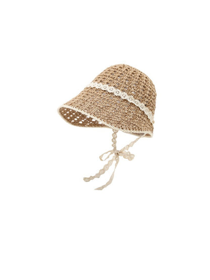 Haila knit bucket hat with lace trim and tie straps shown from above