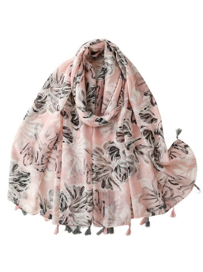 Scarvii botanical flower wrap scarf draped over shoulders showcasing lightweight and flowy material