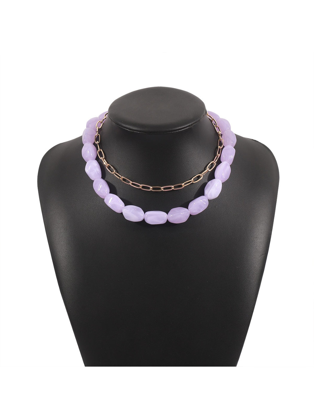 Detailed view of necklace beads in various bright colors
