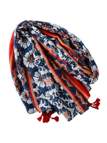 Scarvii scarf laid flat showing complete decorative motif pattern and tassel trim
