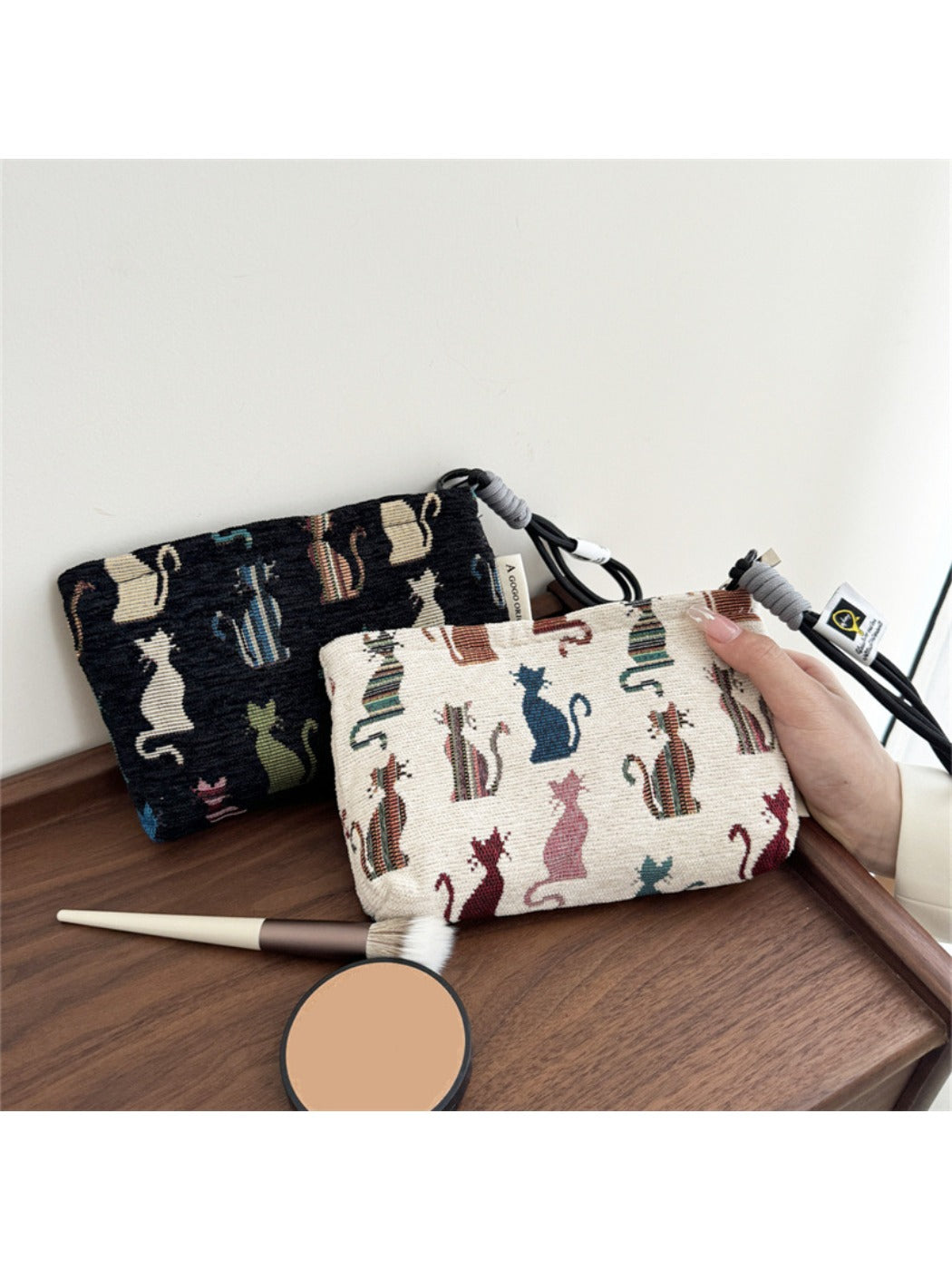 Cosbai mini makeup bag with cat print displayed on a white surface