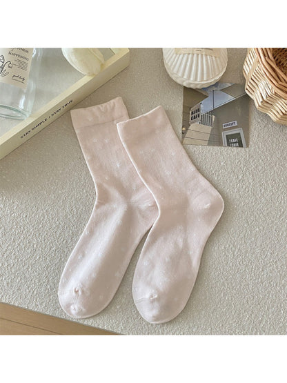 Model wearing Rufia mixed print everyday crew socks with casual shoes