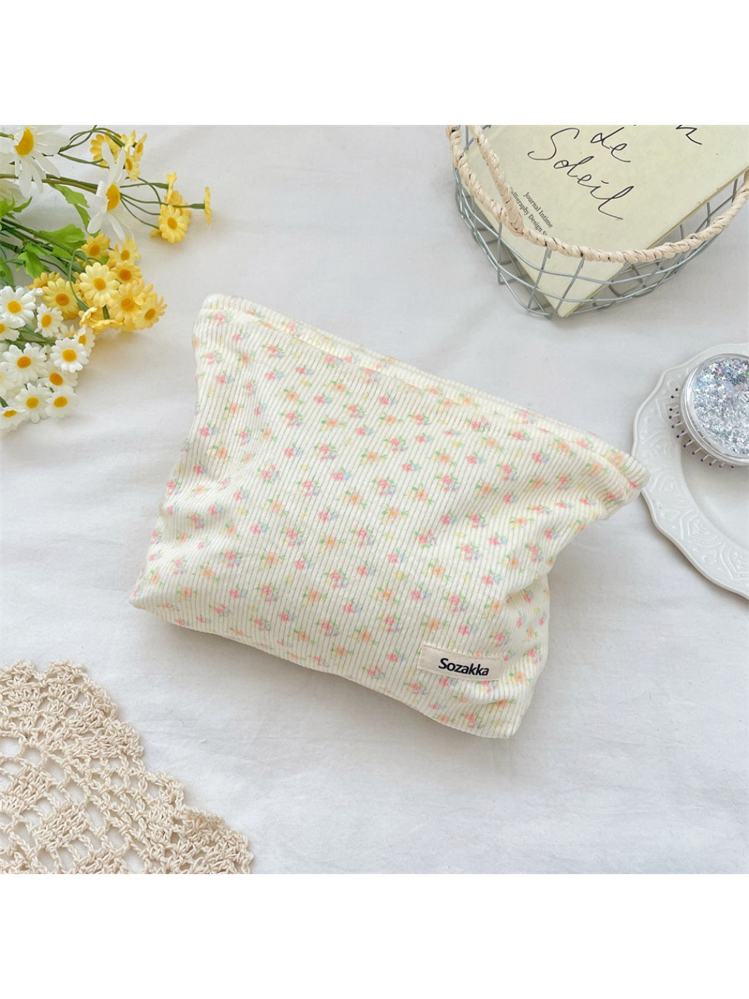 Side view of Cosbai Ditsy Floral Ribbed Cosmetic Pouch highlighting shape and fabric