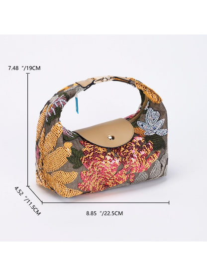Close-up of floral embroidery and sequins on Cosbai shoulder bag