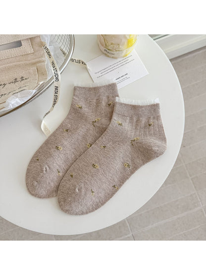 Side view of Rufia ankle socks showing lace trim and soft fabric texture