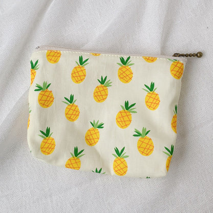 Cosbai canvas printed coin purse lying flat with vibrant artistic print visible