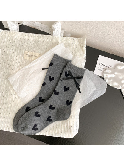 Rufia soft crew socks displayed with packaging and heart pattern visible
