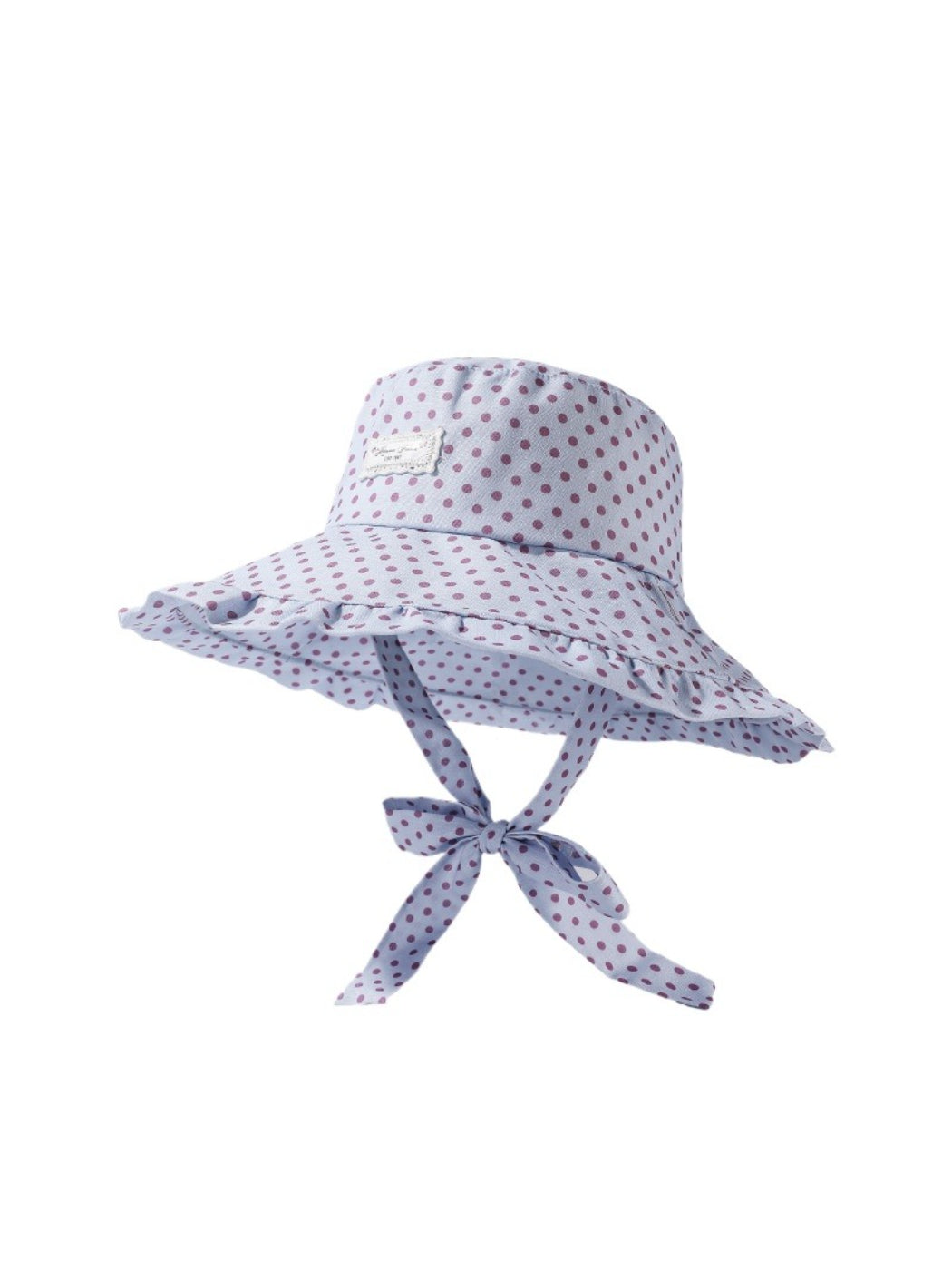 Close-up of Haila hat fabric texture and polka dot design