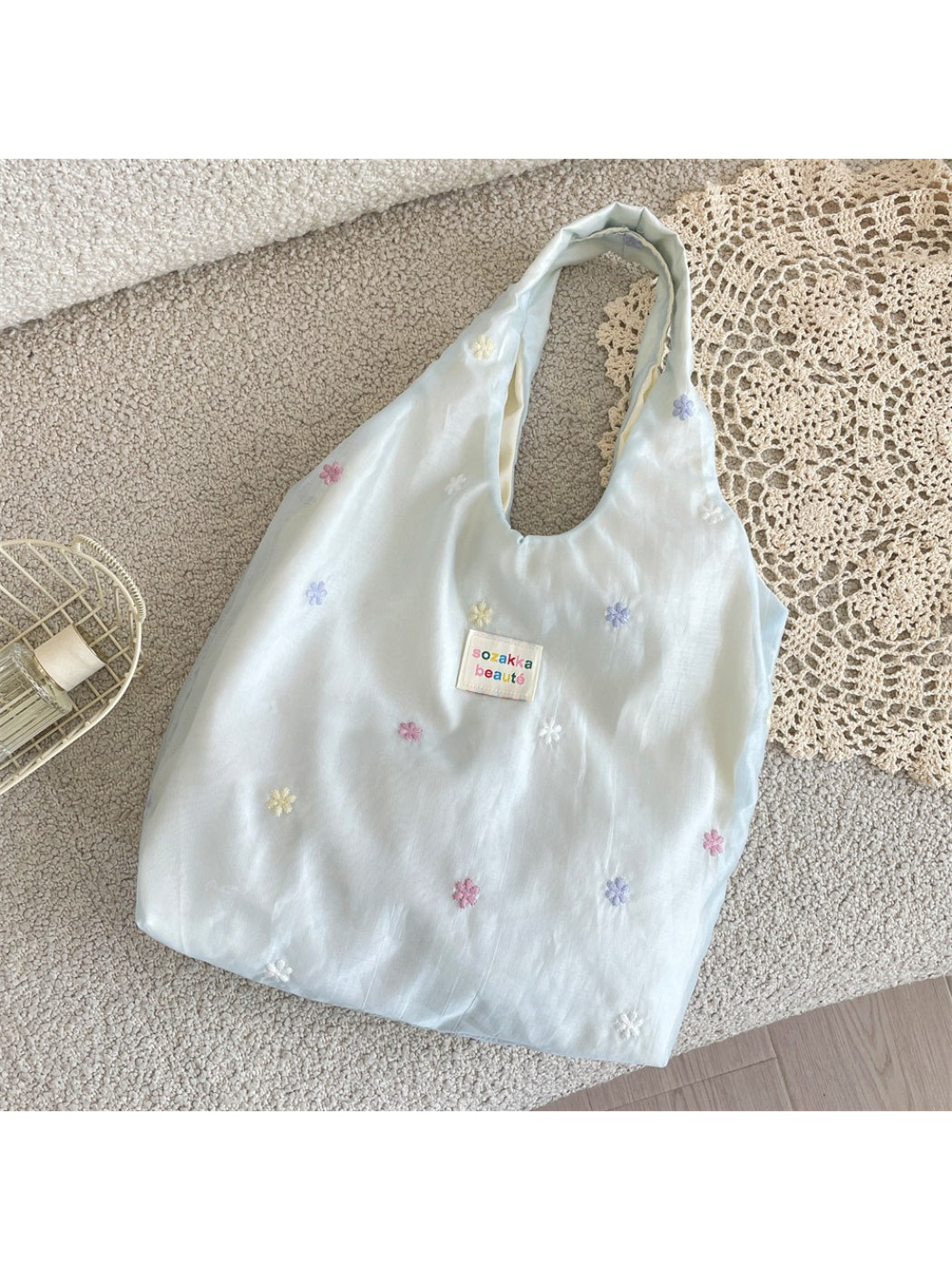 Top view of Cosbai Pastel Daisy Slouch Tote Bag with open interior