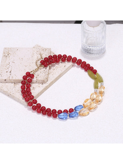 Neckit color block beaded statement necklace worn on a mannequin showcasing its design and colors