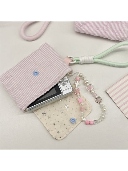 Cosbai mini star key pouch bag held in hand to show scale and portability