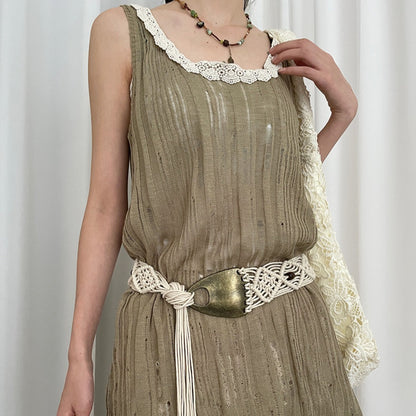 Beco Distressed Metal Woven Vintage Tassel Belt showing woven texture and tassel detail