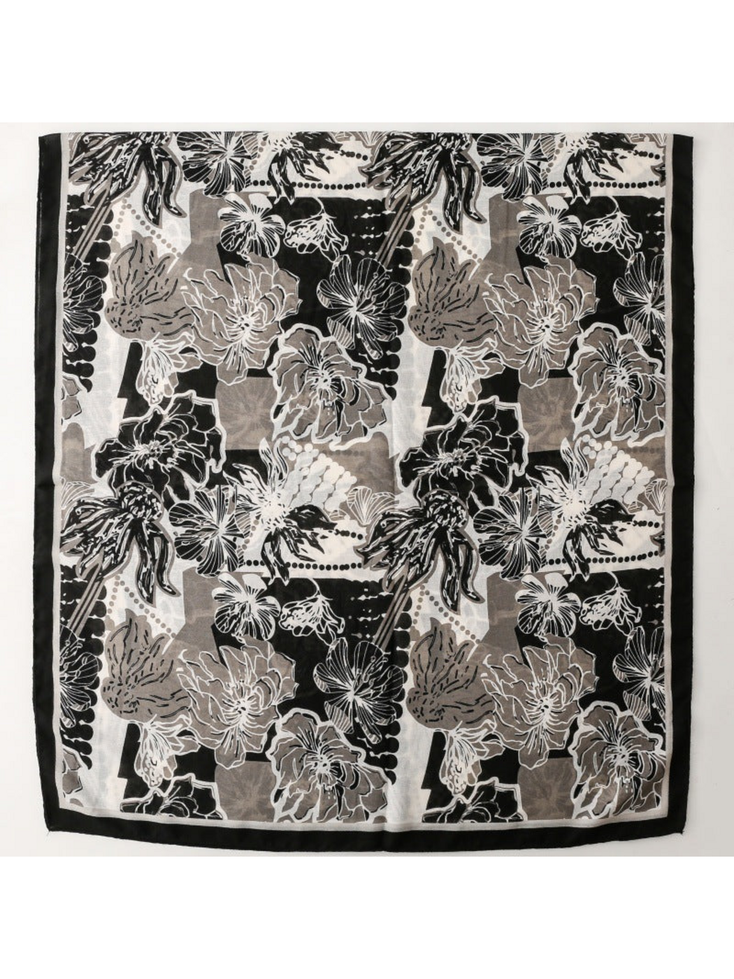 Floral scarf spread flat to show the repeated flower pattern and black border