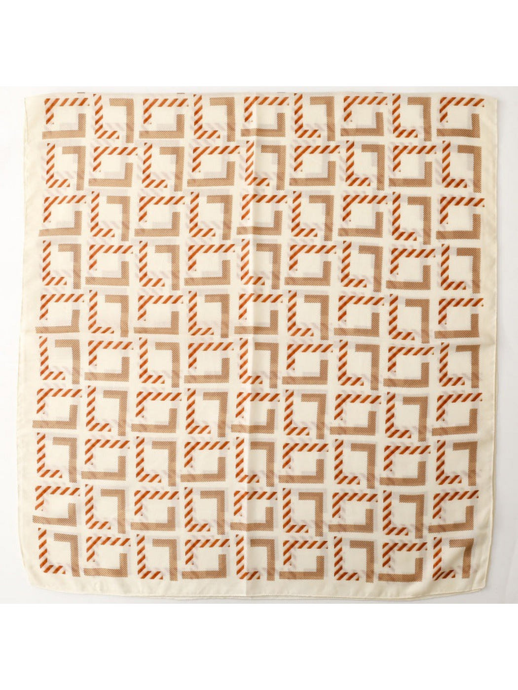 Scarf spread flat to display its repeating angular pattern and plain border