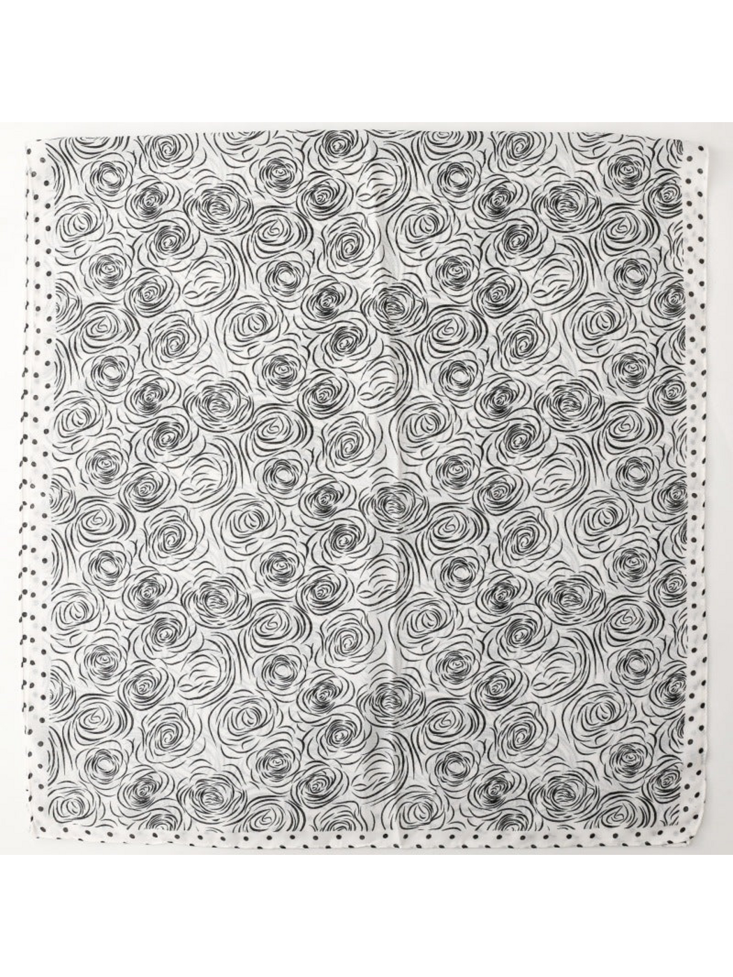 Rose-pattern scarf spread flat with a polka dot border